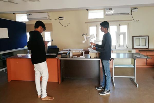 Students analyzing climatic parameters in the climatology lab